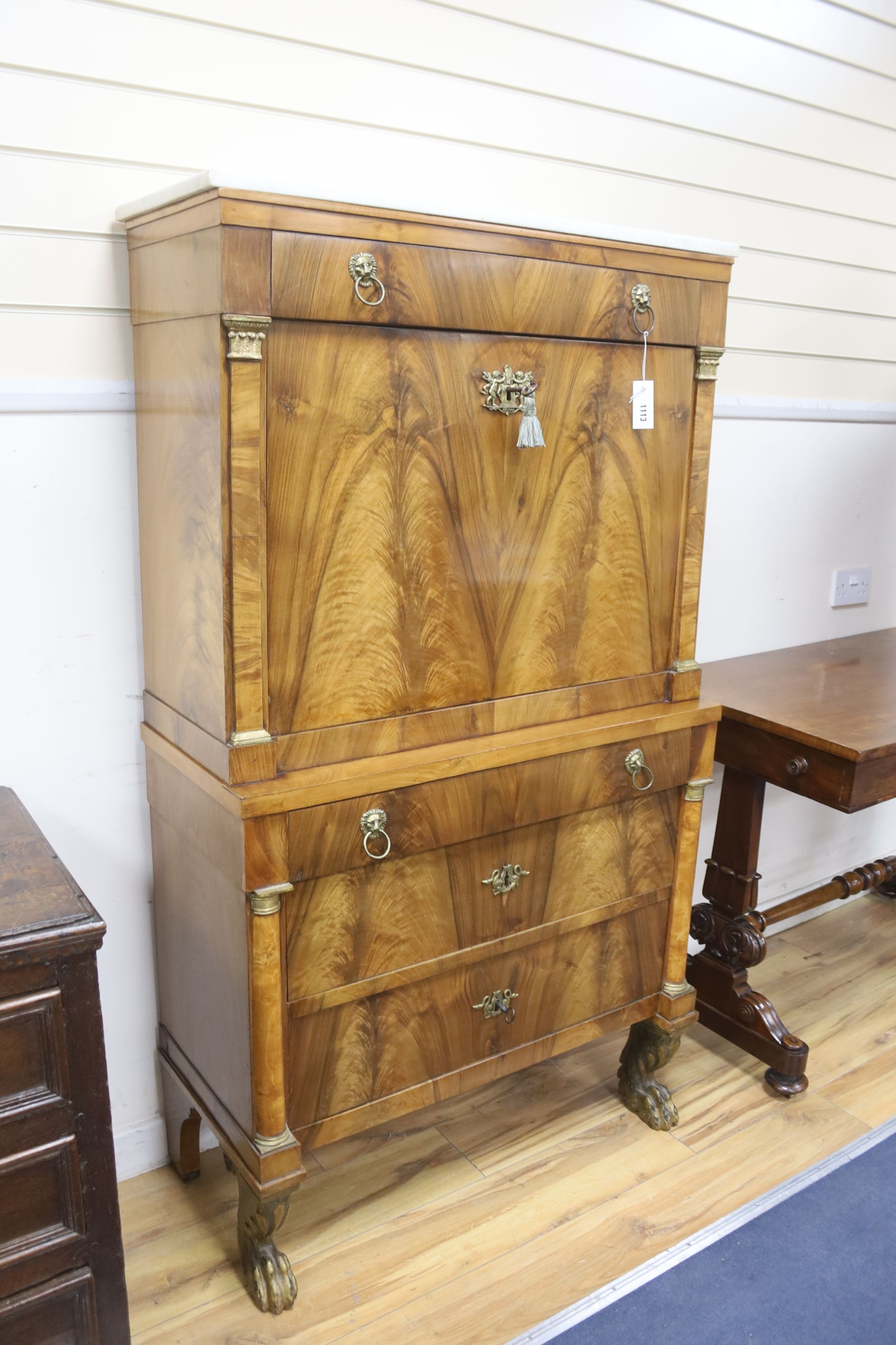 A 19th century French Empire flame mahogany escritoire, width 88cm, depth 37cm, height 155cm